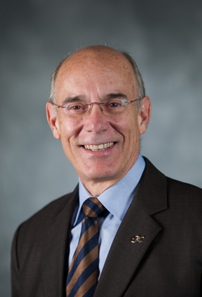 Headshot of man in suit