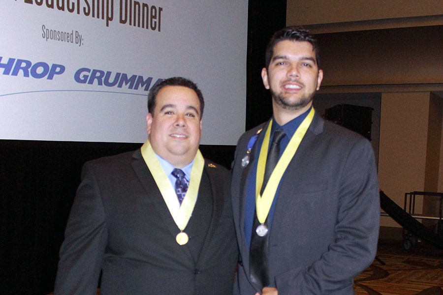 Ph.D. student Osvaldo Broesicke, right, with Latinos in Science and Engineering President Will Davis. Broesicke won the organization's highest honor for students, the Padrino Scholarship and Medalla de Plata, or silve medal. (Photo Courtesy: Osvaldo Broesicke)