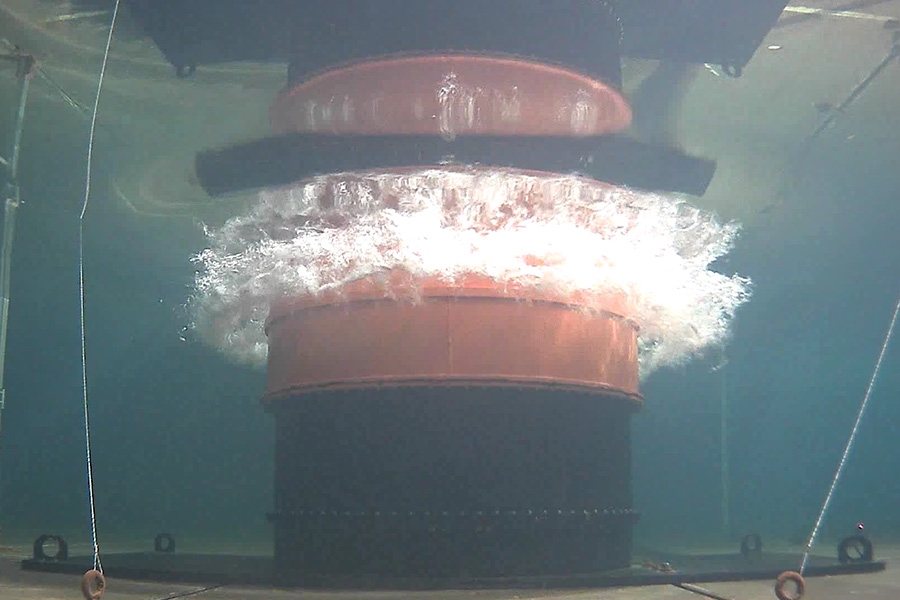 The volcanic tsunami generator simulates a volcanic eruption by “punching” through the water’s surface. Professor Hermann Fritz built this one-of-a-kind setup and conducted a series of experiments to better understand tsunamis created by eruptions of underwater volcanoes. (Photo: Yibin Liu)