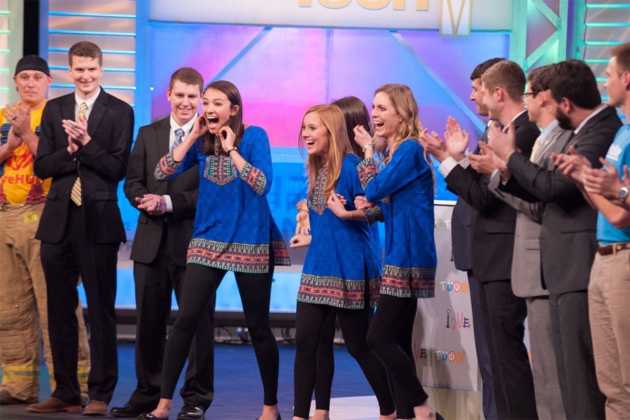 Team TruePani reacts after they're announced as the People's Choice Award winners at the 2016 InVenture Prize finals. The team designed an antimicrobial cup and water storage device that makes drinking water safer. Shannon Evanchec and Samantha Becker have been working full-time for the last year to turn their winning invention into a viable business. (Photo: Fitrah Hamid)